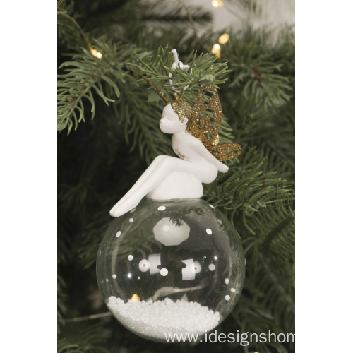 Elegant Angel Sits On A Glass Globe